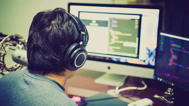 man playing on computer