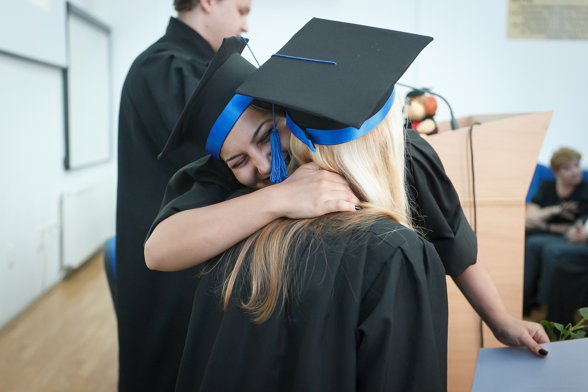 two happy students during a graduation